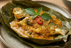 Nikmatnya Brengkes Tempoyak: Ikan Patin Bumbu Kuning Pedas Dibungkus Daun Pisang